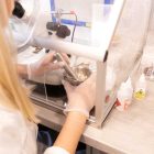 Inspecting asbestos samples - Allium Environmental Ltd